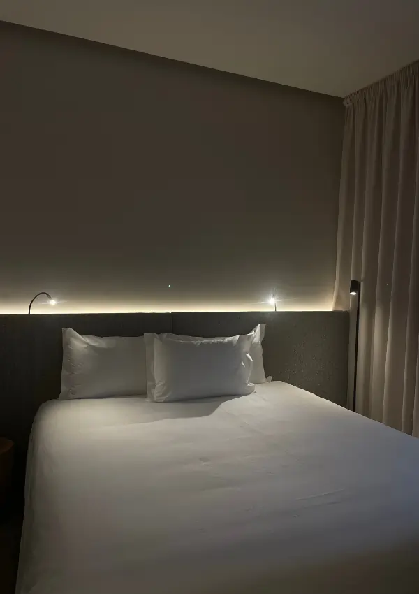 how to make your bedroom feel like a hotel room    