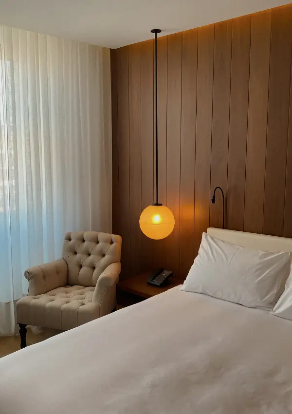 how to make your bedroom feel like a hotel room    